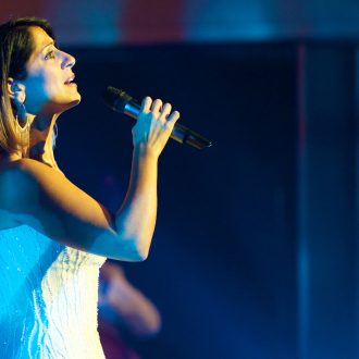 photo of Silvie Paladino singing on stage